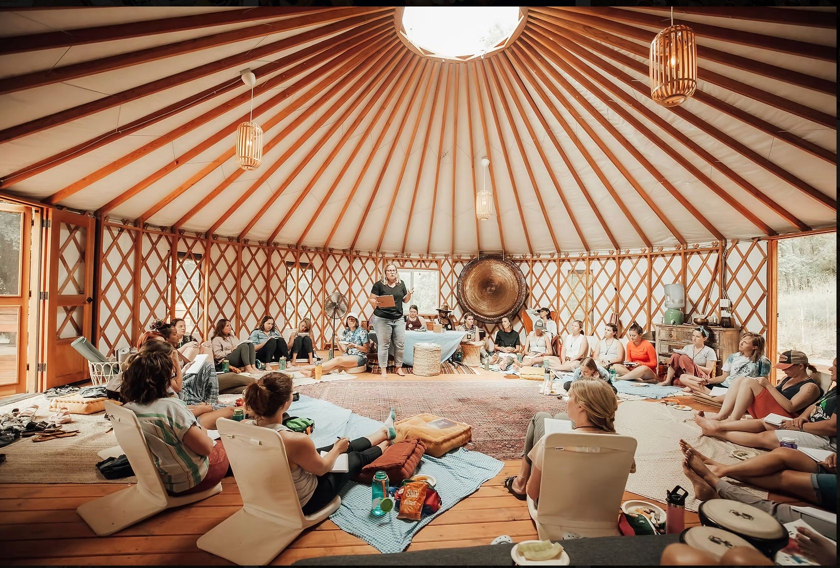 Group session inside the forest yurt